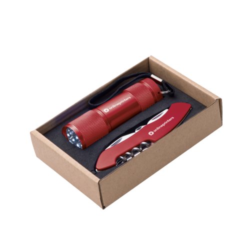 Set rosso composto da torcia in metallo con cinturino e coltellino multiuso.