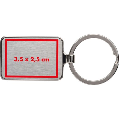 Portachiavi in metallo di forma rettangolare con anello.