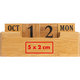 Calendario da scrivania in legno con blocchi data.