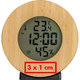 Stazione meteo in legno con display digitale e sensori.